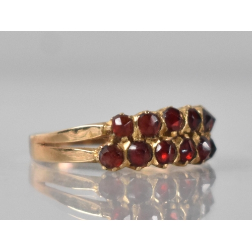 50 - An 18ct Gold and Garnet Ring comprising Two Rows of Rose Cut Type Garnets in Mixed Milgrain, Claw an... 