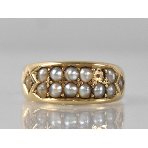 52 - A Victorian 18ct Gold and Seed Pearl Ring comprising Two Rows of Six Pearls (One Missing) Grain Set ... 