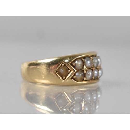 52 - A Victorian 18ct Gold and Seed Pearl Ring comprising Two Rows of Six Pearls (One Missing) Grain Set ... 