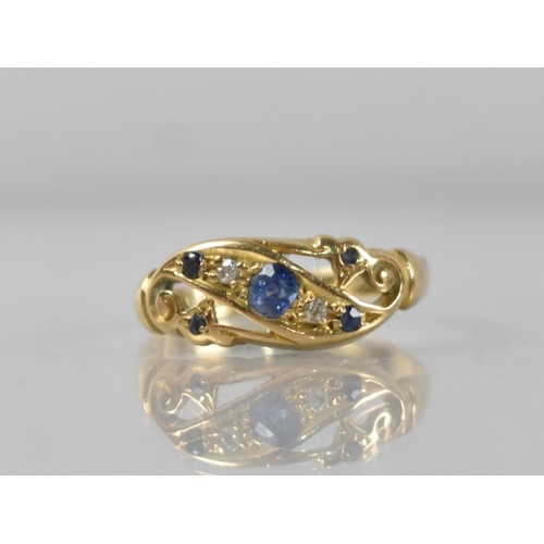 54 - An Early 20th Century 18ct Sapphire and Diamond Ring, Central Mixed Oval Cut Stone Measuring 3.1mm b... 