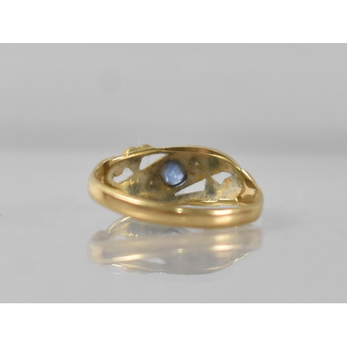 54 - An Early 20th Century 18ct Sapphire and Diamond Ring, Central Mixed Oval Cut Stone Measuring 3.1mm b... 