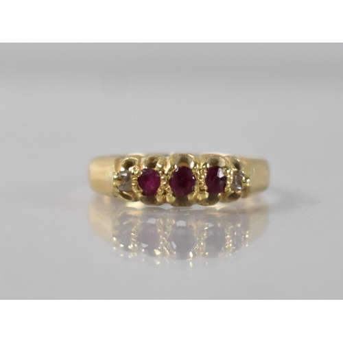 55 - A Victorian 18ct Gold, Ruby and Diamond Ring, Three Old Mixed Round Cut Rubies in Raised Claw and Te... 