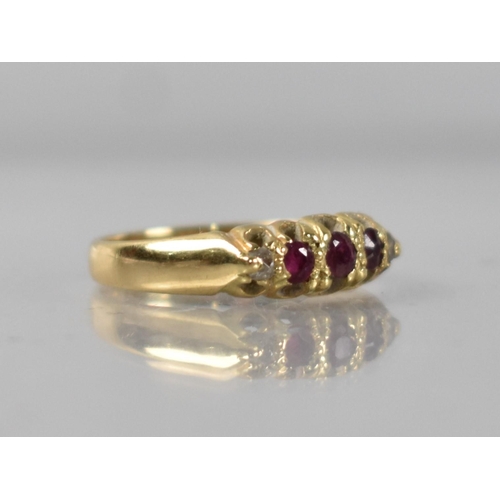 55 - A Victorian 18ct Gold, Ruby and Diamond Ring, Three Old Mixed Round Cut Rubies in Raised Claw and Te... 