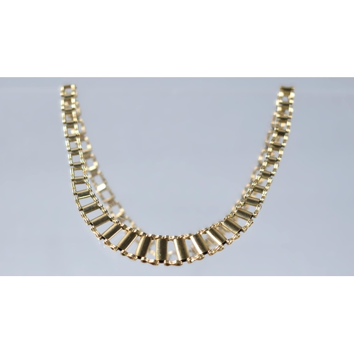 131 - A 9ct Gold Fringe Style Necklace Comprising Graduated Compressed Oval Baton Drops and Figure of Eigh... 