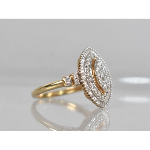 56 - A 9ct Gold and Diamond Cocktail Ring, Central Raised Lozenge With Nine Small Round Cut Diamonds Held... 