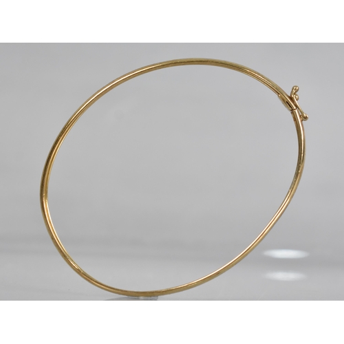 137 - A 9ct Gold Two Tone Bangle having Central Channel with Etched White Metal Decoration, Stamped to the... 