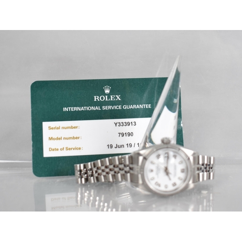 5 - A Ladies Rolex Oyster Perpetual Date Superlative Chronometer Wristwatch, White Enamel Face with Arab... 