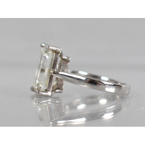 27 - A Diamond Solitaire Ring, Emerald Cut Stone Weighing 4.57cts with Measurements 12.44mm by 8.01mm by ... 