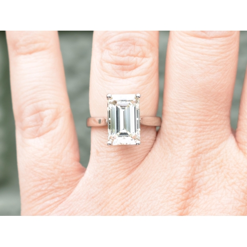 27 - A Diamond Solitaire Ring, Emerald Cut Stone Weighing 4.57cts with Measurements 12.44mm by 8.01mm by ... 