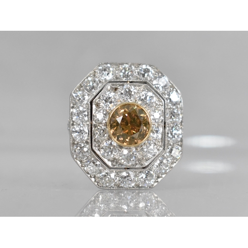 28 - An Impressive Diamond Cluster, Central Round Cut Cinnamon Diamond Measuring 7.98mm by 8.10mm by 5.20... 