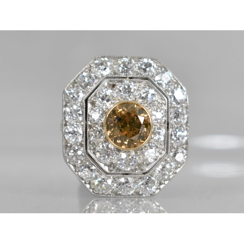 28 - An Impressive Diamond Cluster, Central Round Cut Cinnamon Diamond Measuring 7.98mm by 8.10mm by 5.20... 