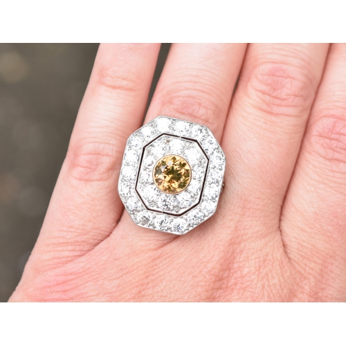 28 - An Impressive Diamond Cluster, Central Round Cut Cinnamon Diamond Measuring 7.98mm by 8.10mm by 5.20... 