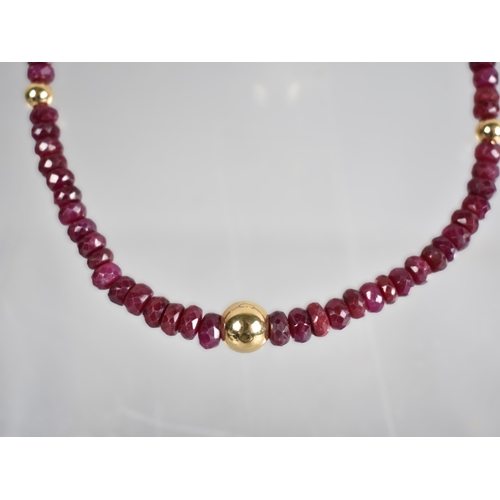 149 - A Ruby Bead Necklace with 18ct Gold Spacers and Clasp, Graduated Faceted Ruby Beads with Largest Mea... 