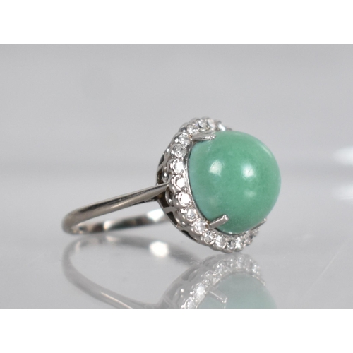 37 - An Art Deco Jadeite and Diamond Ladies Cocktail Ring, High Circular Jadeite Cabochon Measuring 12.8m... 