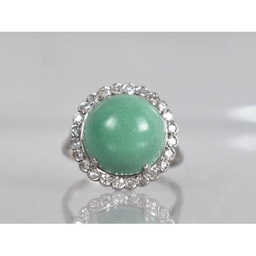 37 - An Art Deco Jadeite and Diamond Ladies Cocktail Ring, High Circular Jadeite Cabochon Measuring 12.8m... 