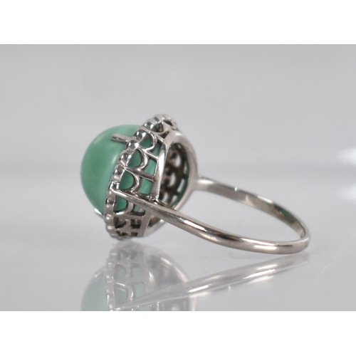 37 - An Art Deco Jadeite and Diamond Ladies Cocktail Ring, High Circular Jadeite Cabochon Measuring 12.8m... 