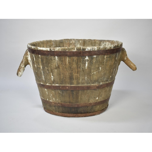 100 - An Early Large Coopered Two Handled Bucket of Oval Form, Perhaps for Peat, 64cm Wide and 50cm High