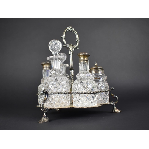 105 - A Victorian Silver Plated Six Bottle Cruet Stand, Two Bottles Silver Mounted