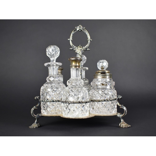 105 - A Victorian Silver Plated Six Bottle Cruet Stand, Two Bottles Silver Mounted