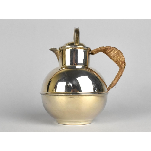 106 - A Silver Plated Guernsey Globular Cream Jug After Kenneth Tyler Key with Rattan Handle, Stamped EPCA... 