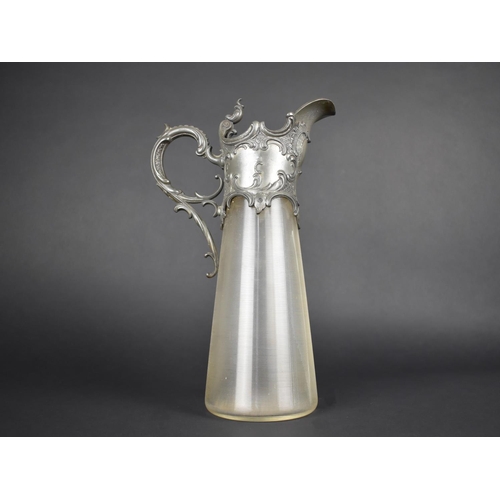 37 - A Britannia Metal Mounted Ribbed Glass Lidded Claret Jug, Art Nouveau Period, 30cm High