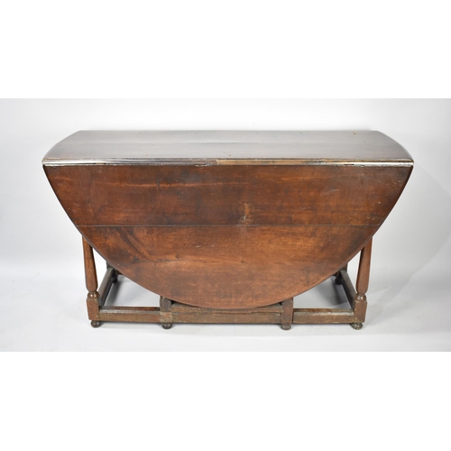 468 - A Drop Leaf Gate Leg Wake Table in Oak, 148cm Long