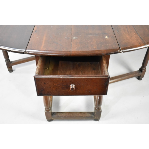 468 - A Drop Leaf Gate Leg Wake Table in Oak, 148cm Long