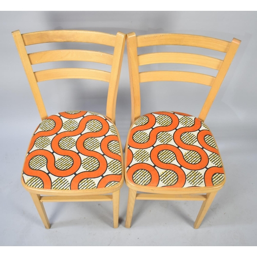 502 - A Pair of Vintage Ladder Back Kitchen Chairs