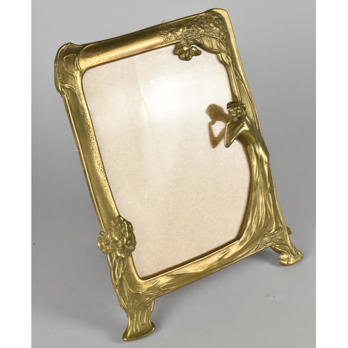 59 - An Art Nouveau Style Brass Photo Frame with Figural and Floral Decoration, 24.5cm High and 20cm Wide