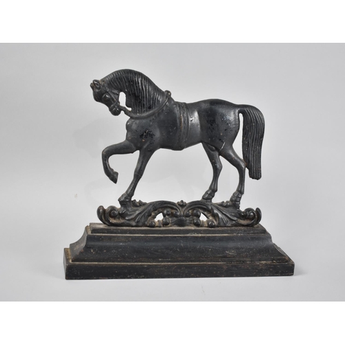 64 - A Black Painted Cast Metal Doorstop in the Form of Stallion on Stepped Rectangular Plinth, 32.5cm Wi... 