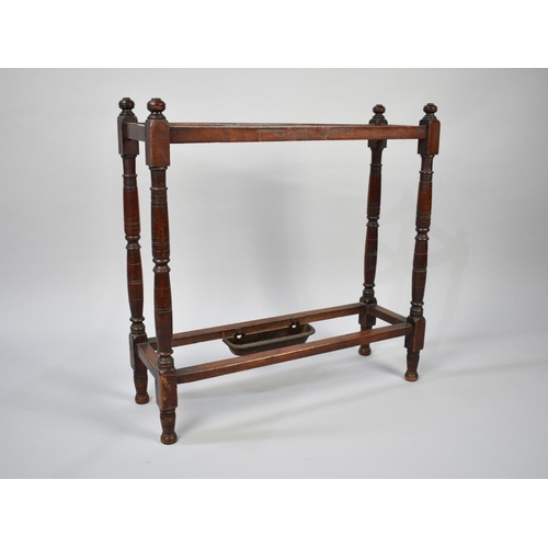 65 - A Late Victorian/Edwardian Three Division Walnut Stick Stand with Turned Supports and Small Metal Dr... 