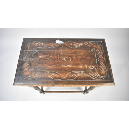 80 - A Gothic Revival Rectangular Side Table with Carved Top and Turned Supports, 76cm Wide