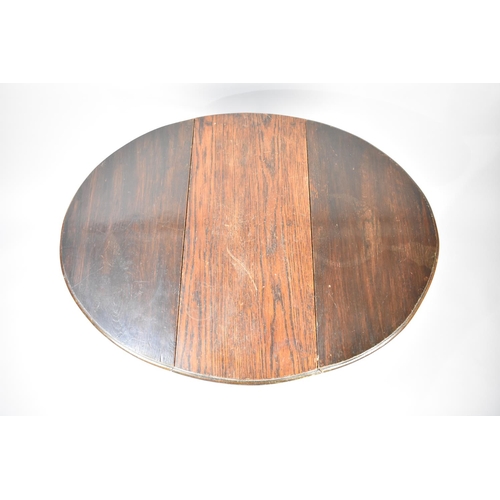 85 - A Small Oak Drop Leaf Gate Legged Table with Bobbin Supports, 63cm Long