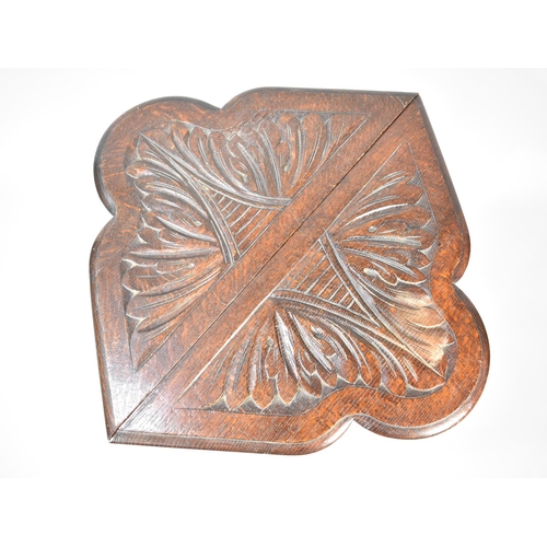 87 - A Late Victorian/Edwardian Drop Leaf Oak Occasional Table with Carved Top and Bobbin Tripod Supports... 