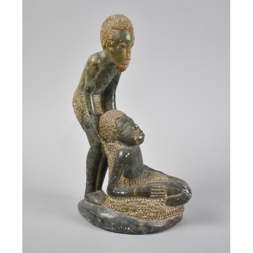 97 - An African Carved Green Stone Figure Group, Husband and Wife, 25cm High