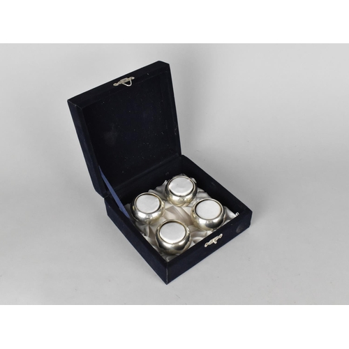 20 - A Cased Set of Four Silver Napkin Rings, Birmingham Hallmark