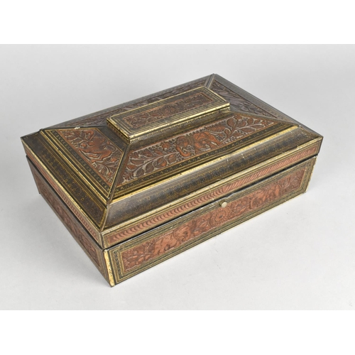 31 - A Vintage Huntley and Palmers Biscuit Tin in the Form of a Sarcophagus Shaped Box in the Indian Styl... 