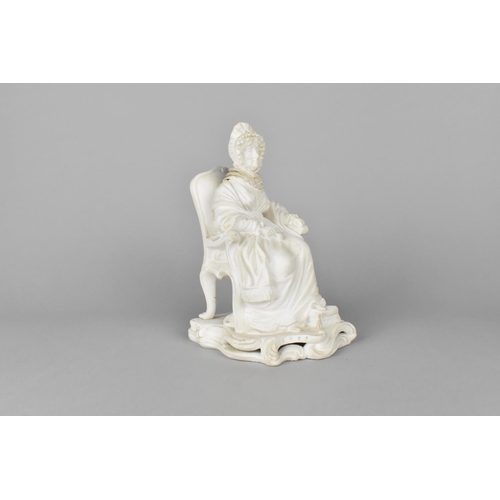 42 - A Derby Biscuit Porcelain Figure of Welsh Lady Modelled Seated on Armchair, 16.5cm high