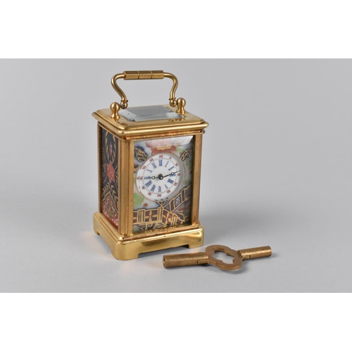 11 - A Miniature Reproduction Gilt Brass and Imari Panelled Carriage Clock, 6cm High,working