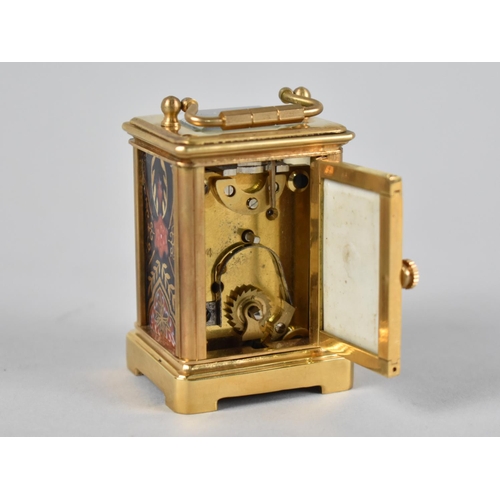 11 - A Miniature Reproduction Gilt Brass and Imari Panelled Carriage Clock, 6cm High,working