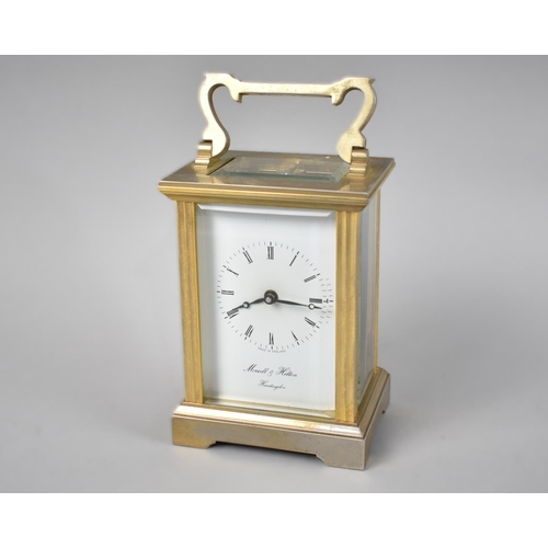 12 - A Mid 20th Century Brass Cased Carriage Clock, the White Enamel Dial inscribed Messell and Hilton, H... 