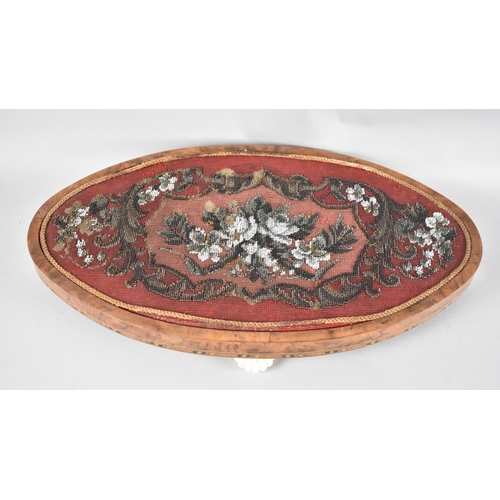 23 - A Late Victorian Inlaid Walnut and Beadwork Topped Oval Stand with Four Ceramic Feet, 50cm Wide