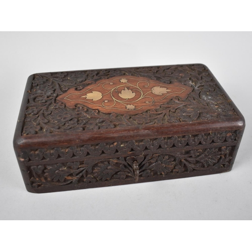 3 - A Carved and Brass Inlaid Far Eastern Hardwood Work Box, 22cm Wide