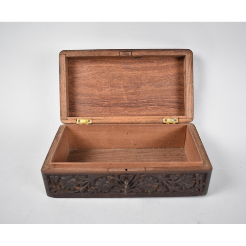 3 - A Carved and Brass Inlaid Far Eastern Hardwood Work Box, 22cm Wide