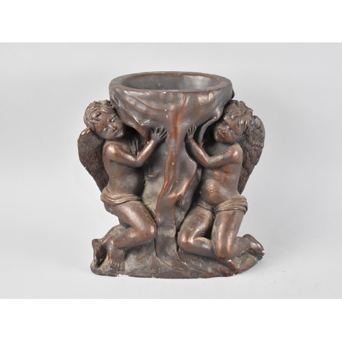 32 - A Mid 20th Century Bronze Effect Moulded Table Centre Stand in the Form of Two Seated Cherubs, 30cm ... 