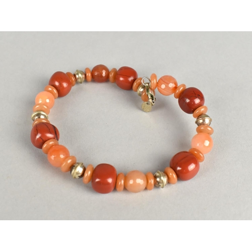 409 - A Silver and Agate Spaced Bracelet