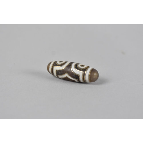 415 - A Reproduction Tibetan Dzi Bead