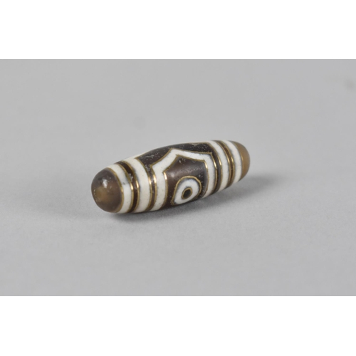 415 - A Reproduction Tibetan Dzi Bead