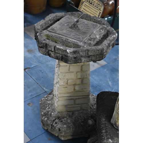 419 - A Reconstituted Stone Garden Sundial with Brick Stylised Support, 62cm high