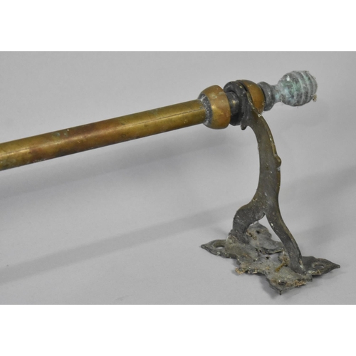 499 - A Late Victorian Brass Door Curtain Pole complete with original mounting Brackets, 132cm wide